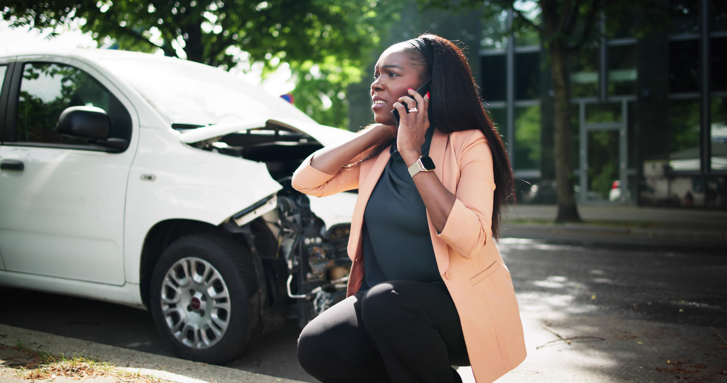 Woman Talking To Reliable Car Mechanic