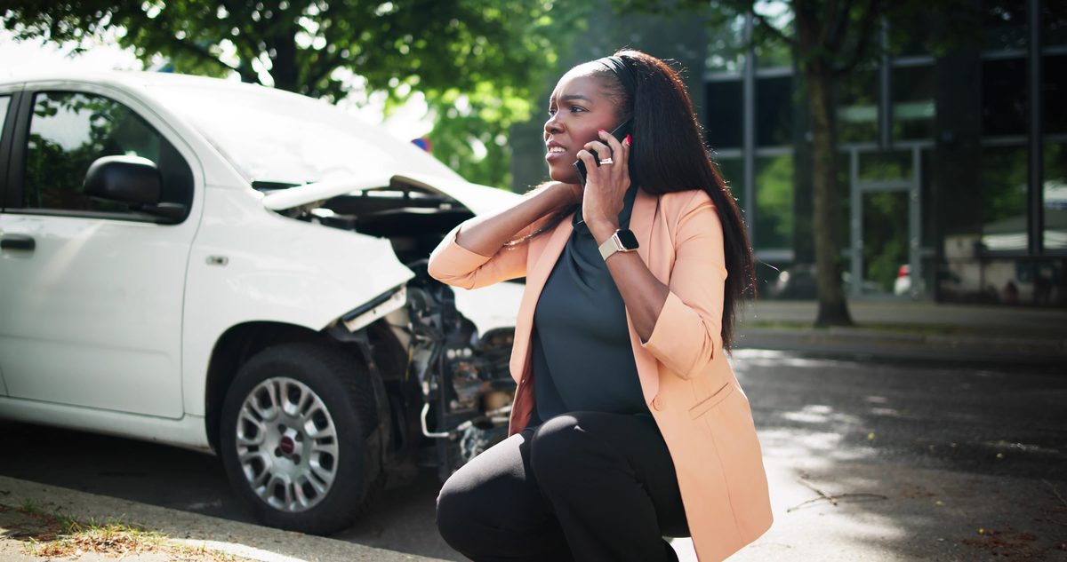Woman calling for help after car accident